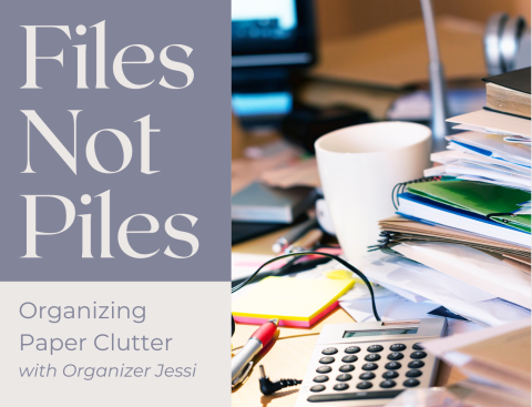 photo of a desk with tall piles of papers, cups of coffee, calculators, and pens covering the workspace